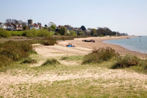 Sandy beach and village of West Mersea, Mersea Island, Essex, England, United Kingdom, Europe