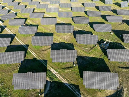 Rows of solar panels at a photovoltaic plant near town of Espejo. Aerial view. Drone shot. Córdoba