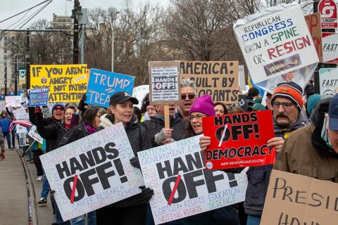 Detroit, Michigan USA - 5 April 2025 - A 'Hands Off' demonstration protests the Trump