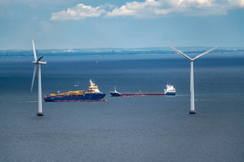 Wind turbines, offshore wind farm east of Copenhagen, in Øresund, cargo ship, Nordhavn, Denmark,