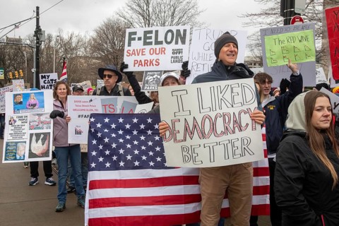 Detroit, Michigan USA - 5 April 2025 - A 'Hands Off' demonstration protests the Trump