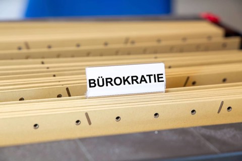 Sign with the inscription BÜROKRATIE on a suspension file folder (symbolic image)