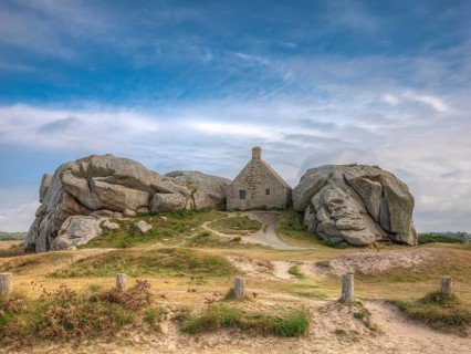 The Guard House (Corps de Garde) ("Customs House") between two huge granite rocks, Site de Meneham,