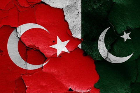 Flags of Turkey and Pakistan painted on cracked wall