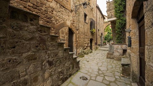 Ancient tufa buildings in the hilltop village of Civita di Bagnoregio, Lazio, Italy, Europe