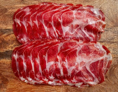 Sliced cured ham, prosciutto, italian dish, delicacy, parma ham, top view, no people