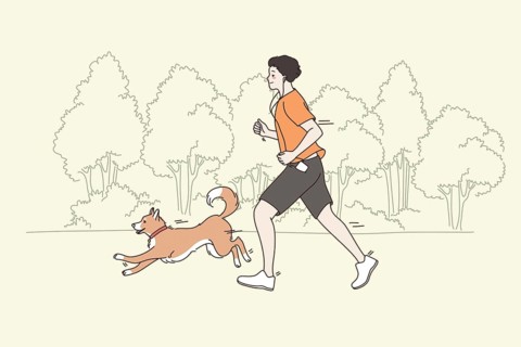 Spending time and sport with pets concept. Young smiling man running jogging in park with his dog