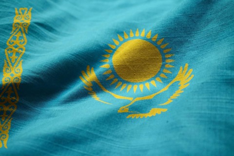 Closeup of Ruffled Kazakhstan Flag, Kazakhstan Flag Blowing in Wind