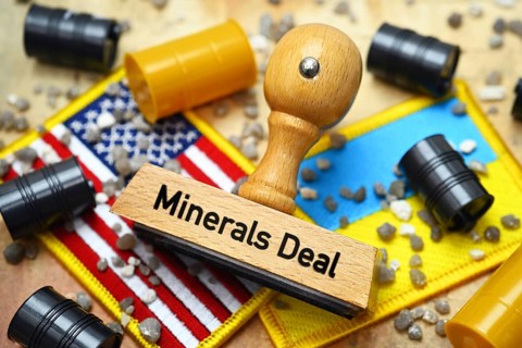 Stamp with inscription Minerals Deal on the flags of the USA and Ukraine with barrels and stones,