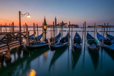 Dawn, Venetian gondolas with the church of San Giorgio Maggiore in the background, Venice, UNESCO
