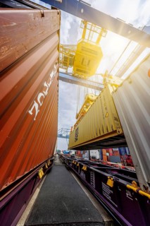 Crane loading containers onto a train in the Port of Duisburg, Terminal D3T, Logport l, Rhine,
