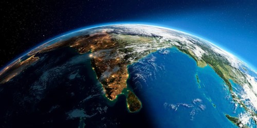 Highly detailed Earth with atmosphere, exaggerated relief and light-flooded cities. Transition from
