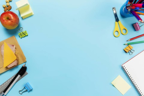 Flat lay with school, work or creativity concept with various schooling accessories, pens, pencil,