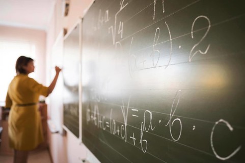 Portrait teacher writing chalkboard. Resolution and high quality beautiful photo