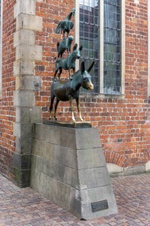 The famous bronze statue of the Bremen Town Musicians with the figures of a donkey, dog, cat and