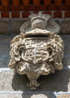 Stonework carving of noble family coat of arms, 15 Rua de Donas, city of Guimaraes, northern