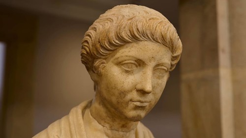 Classical marble bust of a man with antique hairstyles in rich detail, Age of Marcus Aurelius,