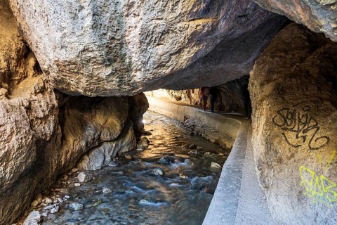 Hiking path Los Cahorros de Monachil, along the Rio Monachil river, narrow path in the river gorge,