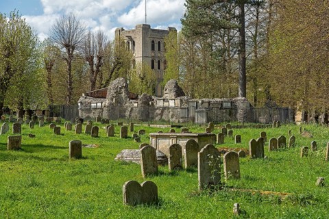 Norman tower, also called church gate, graveyard, gravestones, Bury St Edmunds, West Suffolk,