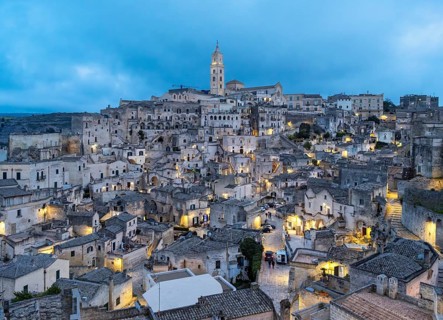 Panoramic View of Sassi di Matera at dusk, Sasso Barisano, Basilicata, Italy, Europe