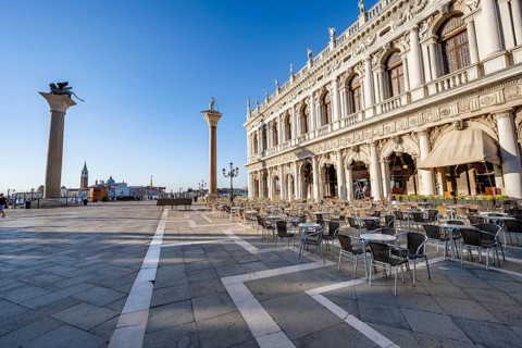 Chairs and tables of cafes at Piazetta San Marco, Colonna di San Marco and Colonna di San Todaro,