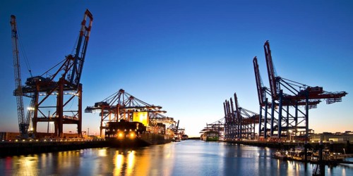 Container ships at Eurogate container terminal and Burchardkai in the evening, Port of Hamburg,