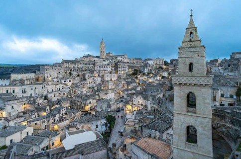 Panoramic View of Sassi di Matera at dusk, Sasso Barisano, Basilicata, Italy, Europe