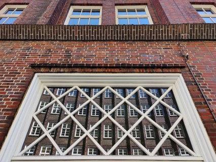 Reflection of the façade of the Sprinkenhof, Brick Expressionism, Kontorhausviertel, UNESCO World