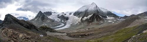 Mountain hut Cabane des Dix in front of glacier Glacier de Cheilon and summit Mont Blanc de