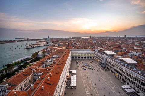 Panorama, St Mark's Square and Basilica di Santa Maria della Salute on the Grand Canal at sunset,
