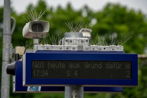 Display board, at a station, train cancellation announcement due to construction work, display