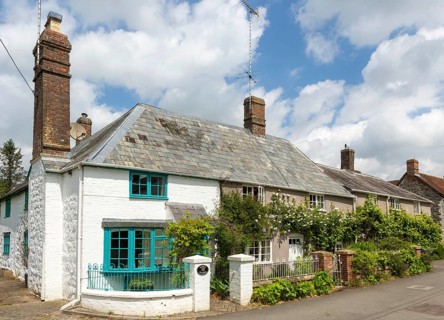 Attractive historic cottages in village of Avebury, Wiltshire, England, UK