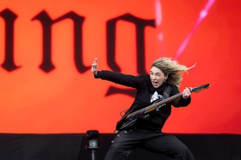 Daniela Villarreal Vélez, singer of The Warning is surprised by a gust of wind at the Rock am Ring