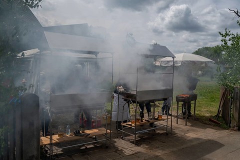 Heavy smoke at the sausage grill stations at the Backofenfest, Kleingeschaidt, Middle Franconia,