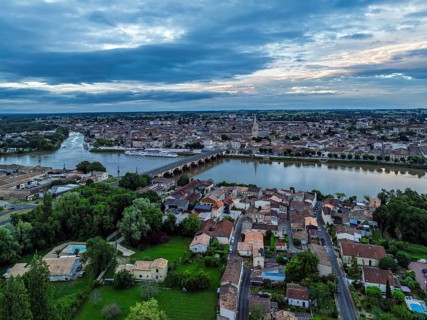 Twilight over Libourne from a drone, Gironde, Nouvelle-Aquitaine, Saint-Émilion and Pomerol,