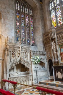 Stained glass windows and memorial tombs in chancel of Church of Saint Mark, Bristol, England, UK