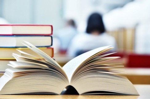 Books lying on the table in the public library