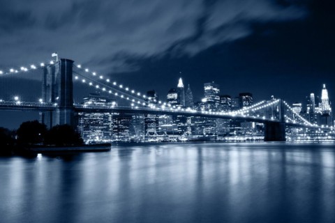 Brooklyn Bridge at night in blue cold tint