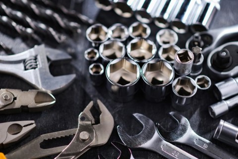 Composition with a variety of metal tools