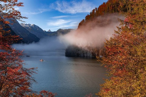 Morning fog in autumn over the Königssee in Berchtesgadener Land, Bavaria, Germany. Fog over the