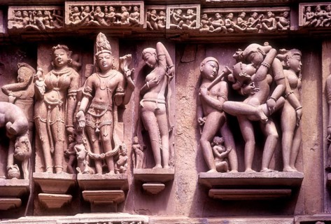 Erotic sculptures on South Facade, Lakshmana temple in Khajuraho, Madhya Pradesh, India, Asia.