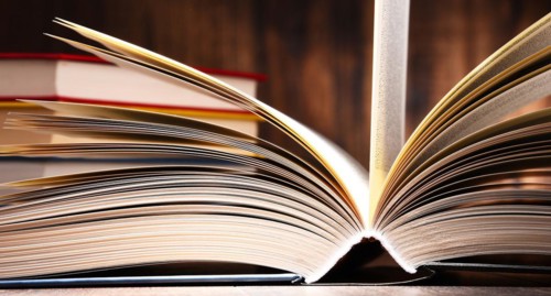 Composition with open book on the table