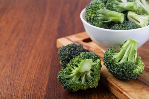 fresh broccoli on a wooden table