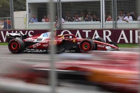 MELBOURNE, AUSTRALIA - MARCH 15: Lewis Hamilton of Great Britain spins the Scuderia Ferrari HP