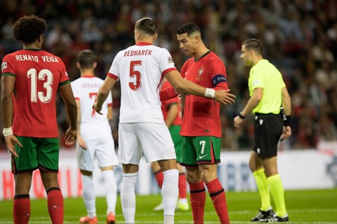 Football match, captain Cristiano RONALDO CR7 Portugal r. with captain's armband is watched from