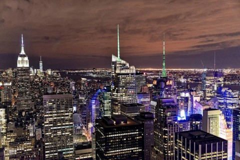 Rockefeller Center observation deck, The skyline of a big city after dark with many lights,