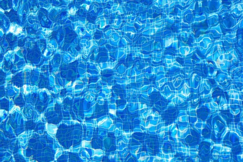 Blue tiles pool water ripple texture background