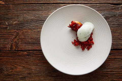 Grilled octopus with parsley air foam served with crunchy chorizo sausage