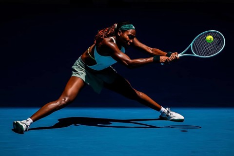 MELBOURNE, AUSTRALIA - JANUARY 19: Coco Gauff of USA hits a backhand to Belinda Bencic of