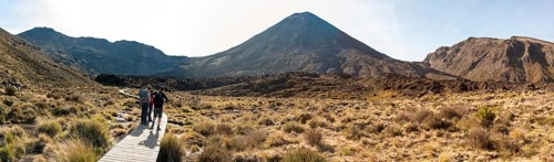Hiking the Tongariro Alpine Crossing through Mangatepopo valley, Mt Ngauruhoe in the background,